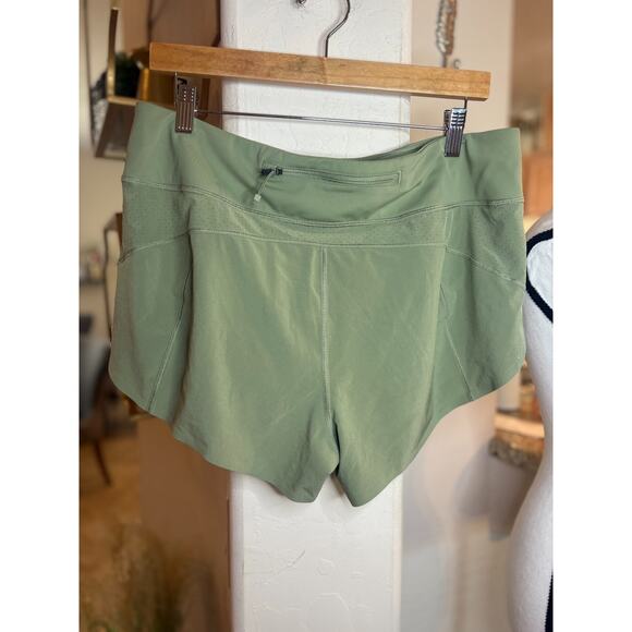 ATHLETA RUN WITH IT Olive Green Running Shorts Size L 10-14 - Picture 3 of 5